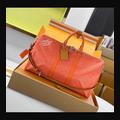 LV Keepall 50 M26865 · 珊瑚紅 Heritage 配色