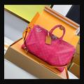 LV Keepall 50 M26868 · 玫紅 Heritage 配色